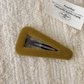 Mustard yellow velvet triangle hair clip with retro French aesthetic on knit background - Triangle Style / Turmeric