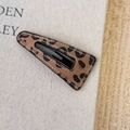 Vintage leopard print hair clip with fine white stitching and a metal snap closure - Light Hollow Large Triangle