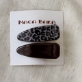 Detail of leopard print and dark brown resin hair clips set on white card packaging - Chubby Triangle Style