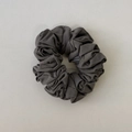 Detailed texture view of a dark grey oversized retro scrunchie with soft cotton fabric - Gray Hair Tie