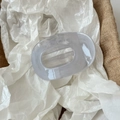 Translucent grey oval hair claw clip with glossy finish for thick hair styling - Gray