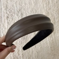 Detail of dark brown faux leather wide headband with textured finish and non-slip lining - Brown