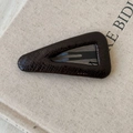 Detailed macro view of dark brown triangle hair clip with faux leather crocodile texture - Coffee Large Triangle Style