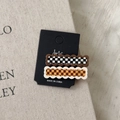 Set of two checkered acetate hair clips with wavy edges on a black card display - Coffee Colors