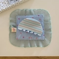 Detail of blue striped hair claw clip on soft fabric showing sleek 2025 design - Blue Striped Semicircle