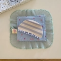 Macro detail of blue and beige striped hair claw clip with dense plastic teeth - Blue-Purple Semicircle