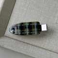 Detail of green plaid hair clip with smooth acrylic finish and shiny metallic silver clasp - Dark Green