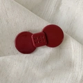 Glossy dark red bow hair clip with embossed wer wer letters in a retro aesthetic - Bowknot Style / Medium / Retro Copper