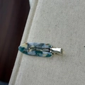 Detail of blue and white marble pattern acetate hair clip with gold metal clamp - Blue