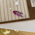Fermaglio per capelli viola in acetato con strass a forma di stella in scatola - Pentagramma Rosso Porpora
