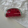 Detail of a watermelon claw clip made of glossy acrylic with seed pattern and red finish - Watermelon