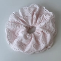 Detail of light pink scalloped scrunchie with delicate floral embroidery and textured fabric - Light Pink