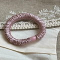 Elegant dusty pink satin scrunchie with soft ruched texture and glossy buckle - Pink