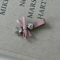 Detailed view of pink ribbon bow hair clip with rhinestone star and silver cloud metal charm - Style C (Pink Ribbon Star Cloud)
