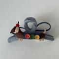 Detail of blue denim hair claw clip with a cute handmade plush dachshund and colorful buttons - Dachshund Dog Hair Clip
