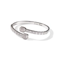 Macro detail of bypass silver bracelet featuring square geometric heads and pavé crystals - Silver