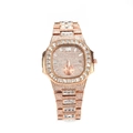 Detalle del reloj de oro rosa con ventana de fecha y bisel de cristales - Oro rosa