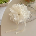 Elegant white lace scrunchie with ribbons on a metal tray for romantic hairstyles - Off-white