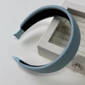 Minimalist light blue padded sponge headband with soft matte fabric for high cranial top look - Green