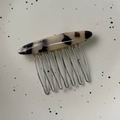 Detail of tortoise shell acetate hair comb with eight sturdy silver metal teeth - Light Tortoiseshell