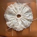 Oversized white lace scrunchie with layered ruffles and cream ribbon bow accents - Off-white