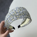 Detail of grey and yellow floral wide headband with non-slip ends and inner fabric lining - Grey Floral Headband