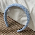Detail showing blue and white plaid fabric headband with non-slip lining on woven mat - Wide Blue Plaid