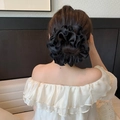 Detail of a large black satin scrunchie styled in a professional updo hairstyle - Bun Hair Scrunchie / Black