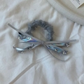 Detail of dark gray mesh scrunchie with satin bow and sparkling rhinestone accents - Bow Scrunchie