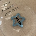 Detail view of light blue star hair clip with fabric texture and metal duckbill clip back - Five-pointed Star (XY-888) / Light Blue Stars