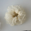 Detail of off-white mesh scrunchie with lace polka dots and delicate wavy edges - Yellow