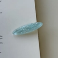 Pasador de pelo ovalado azul claro de resina con purpurina y copos plateados - Azul