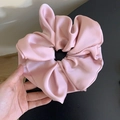 Macro shot of oversized cherry pink satin scrunchie with soft silk luster and rich folds - Large / Pink
