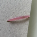 Macro detail of pink acetate leaf hair clip with gold France Handmade lettering - Pink