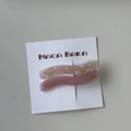 Detail of pink marble acetate wave hair clips on a white display card packaging - Pink Series
