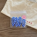 Detail showing set of four blue and white polka dot teardrop hair clips in a clear pouch - Blue Polka Dot
