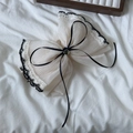 Elegant off-white chiffon bow hair claw clip with black lace edges and golden detail - Off-white