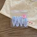 Close-up of four blue and white checkered BB hair clips in transparent packaging - Light Blue Plaid