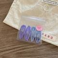 Set of four blue and purple checkered BB hair clips in gift packaging on wooden background - Navy and Purple Gingham Mix