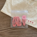 Detailed view of red and white checkered BB hair clips in a transparent thank you package - Red Check