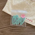Three-piece green checkered wave hair clips in premium transparent gift packaging - Green Check