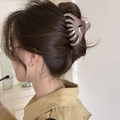 Close-up of a coffee-colored water ripple bow hair claw clip for elegant hairstyling - Crescent Moon Claw / Coffee