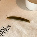 Detailed macro of dark olive green acetate barrette with Creation France gold metal clip - Army Green