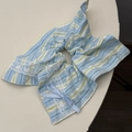 Detailed close-up of blue striped scrunchie with heart lace and silk ribbon bow - Blue Square Towel