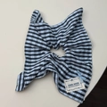 Detail view of blue striped scrunchie with hand made fabric label and ribbon bow - Deep Blue Striped