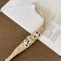 Dettaglio fascia boho fatta a mano in corda di canapa con conchiglie naturali e perline - Stile Intrecciato Perline Nere Conchiglia Corda di Canapa (Modello C)