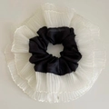 Ballet style oversized satin scrunchie with black and white pleated lace edge design - Black