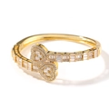 Detail of gold heart bangle featuring pave-set trapezoid and round cubic zirconia - Gold