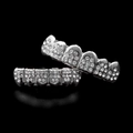 Macro detail of silver hip hop teeth grillz set with sparkling iced out pave diamonds - Silver Set (6 Teeth and 8 Diamonds)