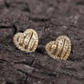 Hollow heart stud earrings in gold finish with sparkling pavé cubic zirconia accents - Heart Cutout Style / Gold